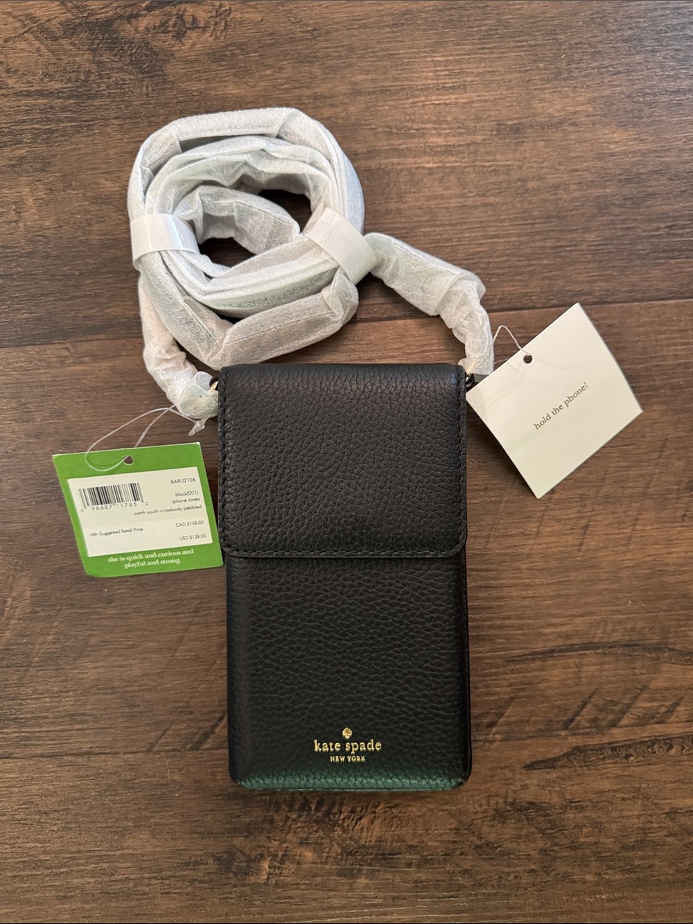 kate spade black pebbled leather phone crossbody with gold logo